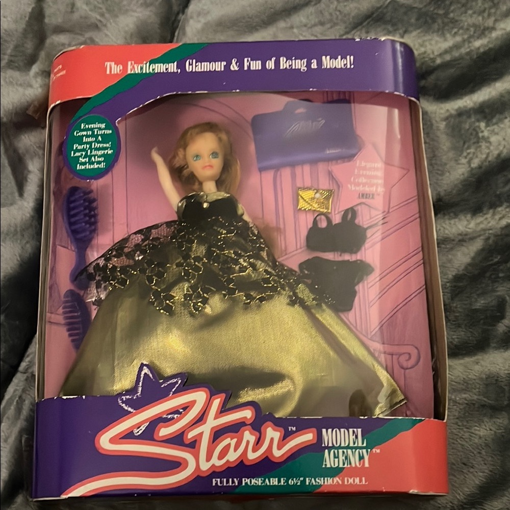 Elegant Gold and Black Doll with Accessories